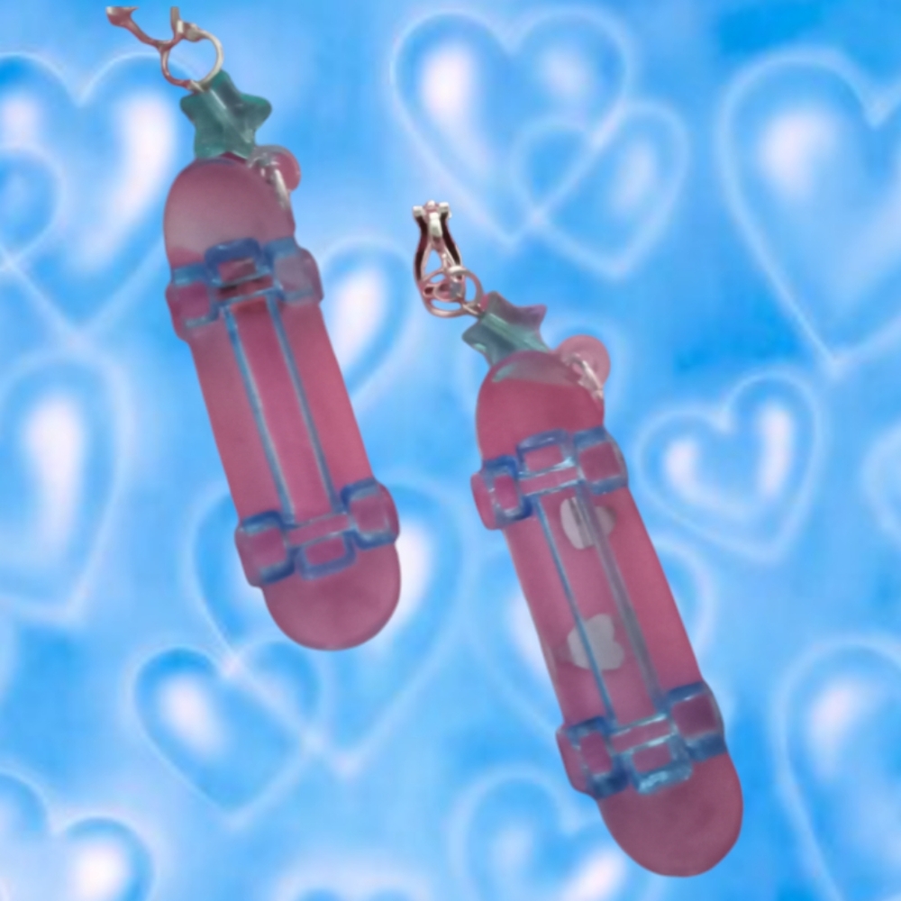 Blue skateboard clip on earrings
